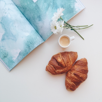 Relaxing with croissants and coffee espresso at home Relaxing with croissants and coffee espresso at home