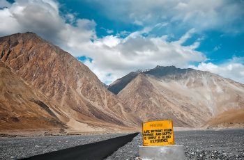 Road sign.
Add depth to your life —
Aim high, but
venerate the basics.