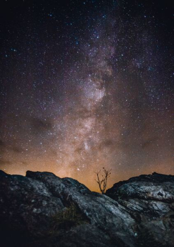 rock with background of stars rock with background of stars