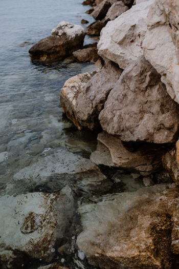 Rocks by waterside Rocks by waterside