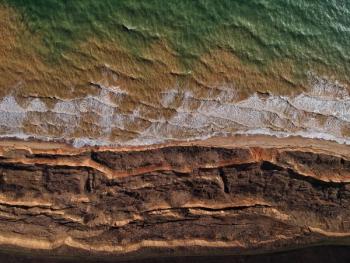 rocky beach with sea waves rocky beach with sea waves