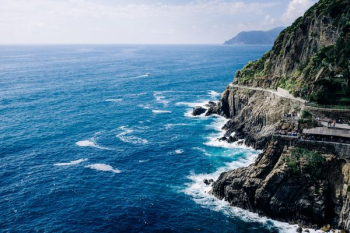 rocky mountain surrounded by ocean nature photography rocky mountain surrounded by ocean nature photography
