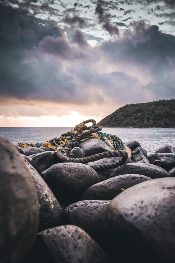 Rope On Rocks Near Ocean Rope On Rocks Near Ocean