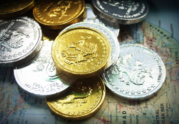 Round Gold and Silver-colored Coins Round Gold and Silver-colored Coins