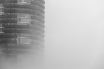 Round Skyscraper In Fog Round Skyscraper In Fog