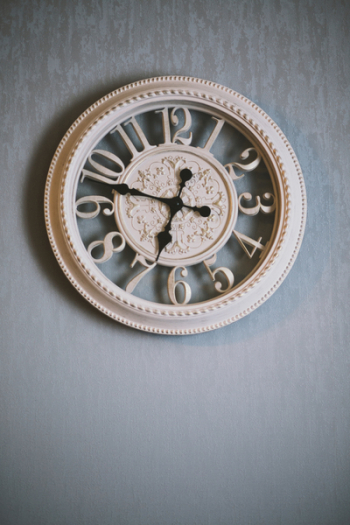 Round White Analog Clock Showing Time Round White Analog Clock Showing Time