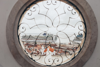 Round Window With View of Town Round Window With View of Town