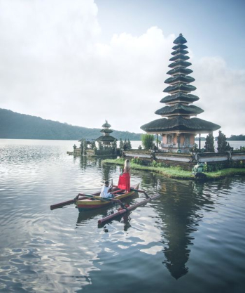 row boat on body of water