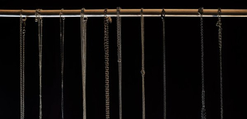 Row Of Necklace Chains Close Up Row Of Necklace Chains Close Up