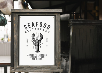 Rustic style sign mockup at a seafood restaurant Free Psd Rustic style sign mockup at a seafood restaurant Free Psd