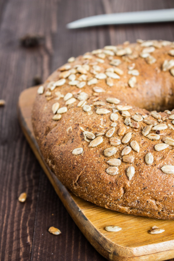 Rye bread with sunflower seeds on wood board Free Photo Rye bread with sunflower seeds on wood board Free Photo
