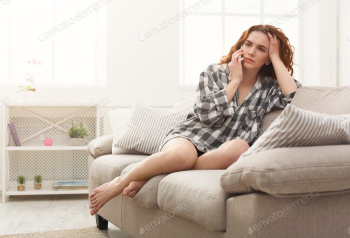 Sad young girl calling on mobile phone photo by Prostock-studio on ...