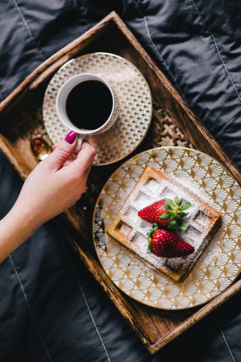 Saffle with strawberries and cup of coffee Saffle with strawberries and cup of coffee