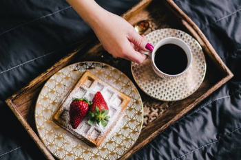 Saffle with strawberries and cup of coffee Saffle with strawberries and cup of coffee