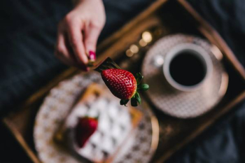 Saffle with strawberries and cup of coffee Saffle with strawberries and cup of coffee