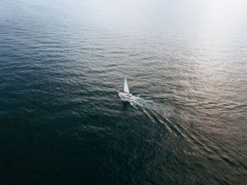 sailboat at the body of water sailboat at the body of water