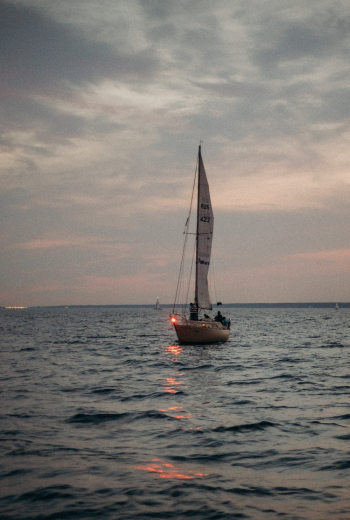 Sailboat on Sea During Golden Hour Sailboat on Sea During Golden Hour