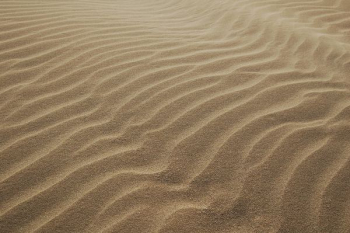 sand dunes during daytime sand dunes during daytime
