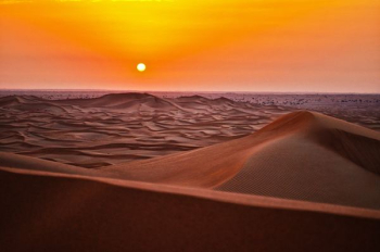 sand dunes during sunset sand dunes during sunset
