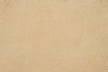 Sand Texture. Brown sand. Background from fine sand. Sand background.