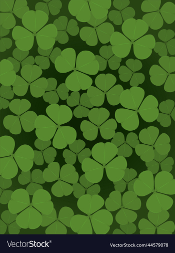 saturated green clover leaves vertical background