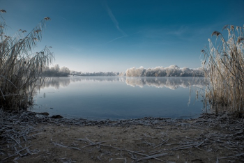 Scenic View of Lake Against Sky Scenic View of Lake Against Sky