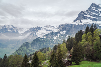Scenic View Of Snow Capped Mountains Scenic View Of Snow Capped Mountains