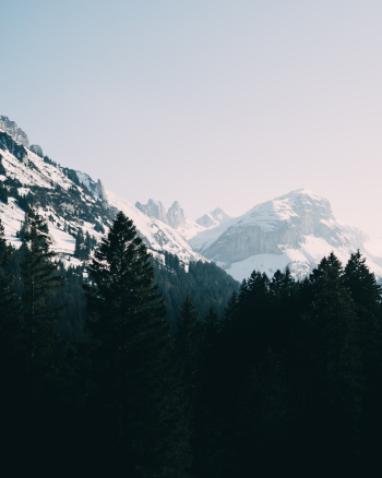 Scenic View Of Snow Capped Mountains Scenic View Of Snow Capped Mountains