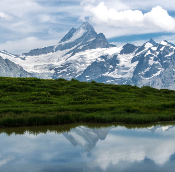 Scenic View Of Snow Capped Mountains Scenic View Of Snow Capped Mountains