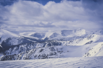Scenic View Of Snow Capped Mountains Scenic View Of Snow Capped Mountains