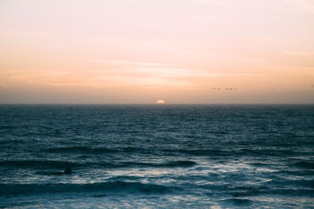 sea waves under sunset sea waves under sunset