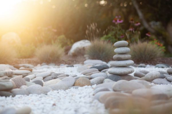 selective focus photo of balance stones selective focus photo of balance stones