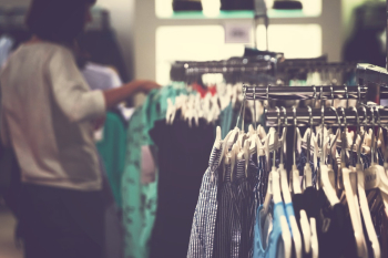 Selective Focus Photo of Clothes on Clothing Rack Selective Focus Photo of Clothes on Clothing Rack