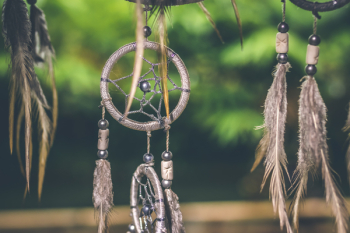 Selective Focus Photo of Gray and Black Dream Catcher Selective Focus Photo of Gray and Black Dream Catcher
