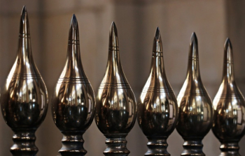 Selective Focus Photo of Six Silver Vases Selective Focus Photo of Six Silver Vases