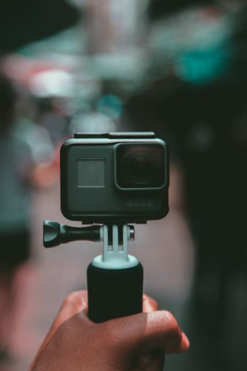 selective focus photography of gray action camera selective focus photography of gray action camera