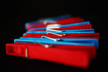 Selective Focus Photography of Red and Blue Clothes Pins Selective Focus Photography of Red and Blue Clothes Pins