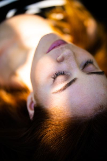 selective focus photography of sleeping woman at daytime