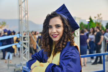 Selective Focus Photography of Smiling Woman in Graduation Gown Selective Focus Photography of Smiling Woman in Graduation Gown