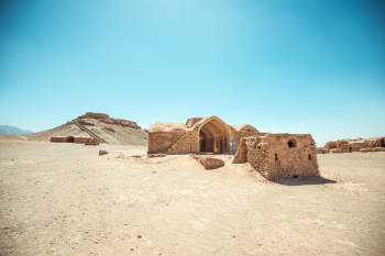 Selective Focus Photography of White Concrete Building in Middle of Desert