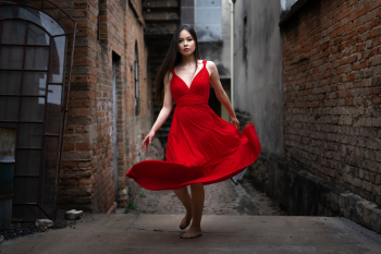 Selective Focus Photography of Woman in Red Dress Selective Focus Photography of Woman in Red Dress