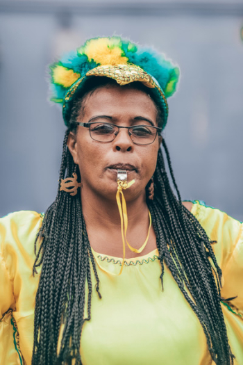 Selective Focus Photography of Woman Using Whistle Selective Focus Photography of Woman Using Whistle