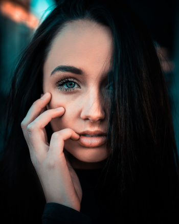 Selective Focus Photography of Woman With Right Hand on Face Selective Focus Photography of Woman With Right Hand on Face