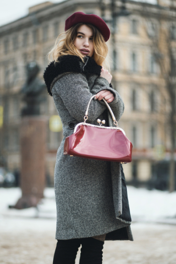 Selective Focus Photography Woman Wearing Gray Coat Standing Near Building