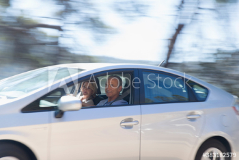Senior couple driving car Senior couple driving car