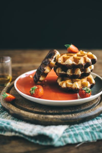 serving of waffle with strawberries serving of waffle with strawberries
