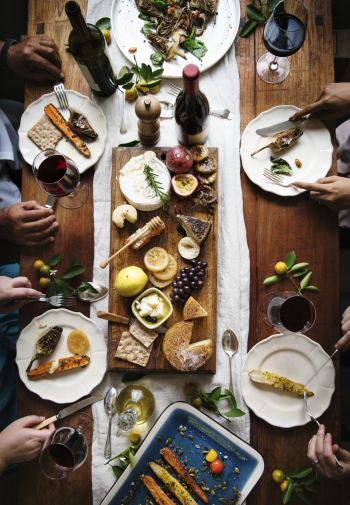 Several People Dining on Table Several People Dining on Table