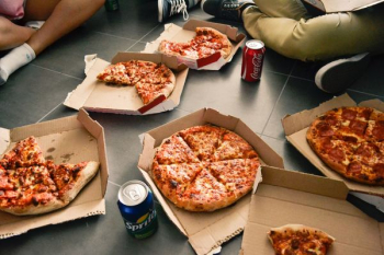 several sliced pizzas
