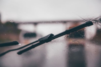 shallow focus photography of black vehicle wiper shallow focus photography of black vehicle wiper