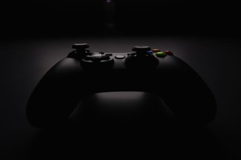 shallow focus photography of black Xbox controller shallow focus photography of black Xbox controller